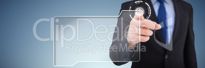 Composite image of businessman pointing his finger at camera