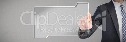 Composite image of businessman pointing with his finger