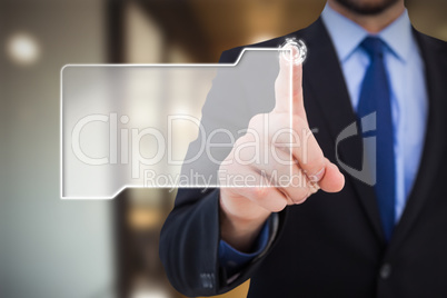 Composite image of businessman pointing his finger at camera