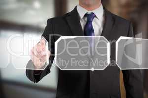 Composite image of businessman standing and pointing