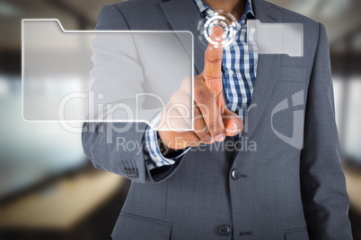 Composite image of focused businessman pointing