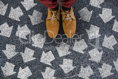 Composite image of close-up of person wearing shoes