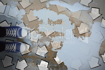 Composite image of high angle view of person wearing canvas shoes