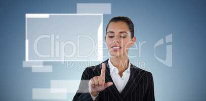 Composite image of businesswoman in suit touching invisible interface