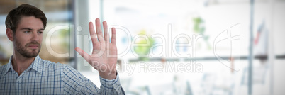 Composite image of man gesturing stop sign against white background Composite image of man gesturing stop sign against white background