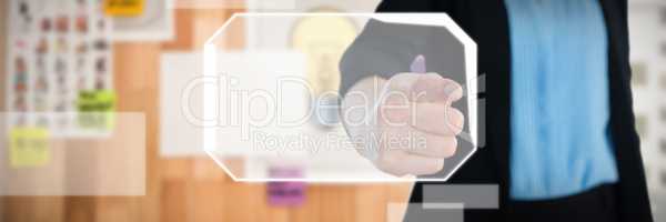 Composite image of mid section of businesswoman touching imaginary interface