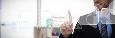 Composite image of mid section of smiling businessman touching invisible screen Composite image of mid section of smiling businessman touching invisible screen
