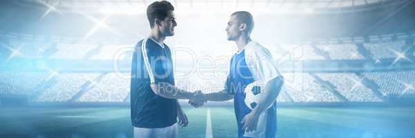Composite image of football players shaking hands