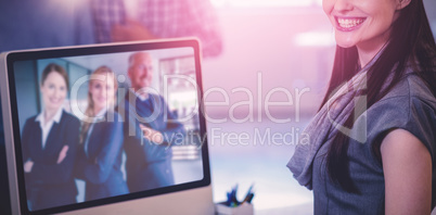 Composite image of portrait of cheerful businesswoman