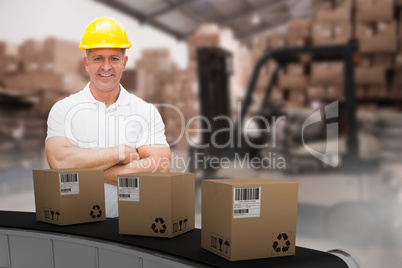 Composite 3d image of worker wearing hard hat in warehouse