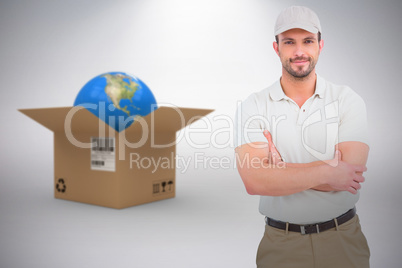 Composite 3d image of delivery man standing arms crossed