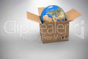 Composite image of 3d image of globe in brown cardboard box