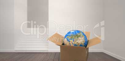 Composite image of 3d image of globe in cardboard box