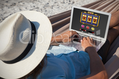 Composite image of slot machine with icons and symbols on mobile screen