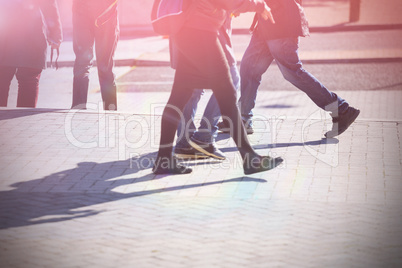 People walking on sidewalk