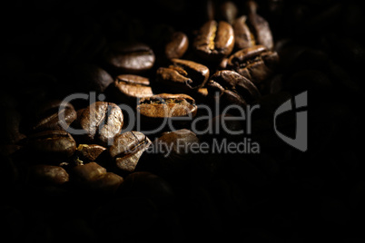 Coffee beans background, shallow DOF, space for text