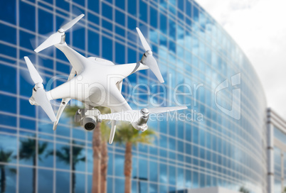 Unmanned Aircraft System (UAS) Quadcopter Drone In The Air Near