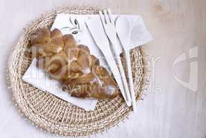 Appetizing sweet white bread on a napkin.