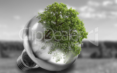 Double exposure: light bulb and nature.