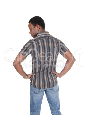 Handsome tall African man standing from back