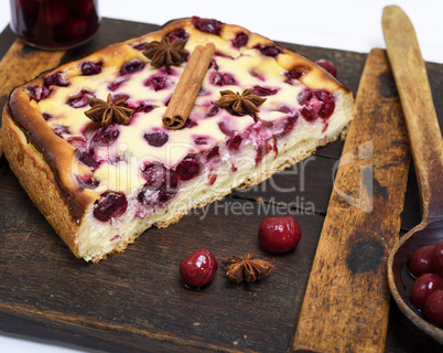 cake of cottage cheese and red cherries , above