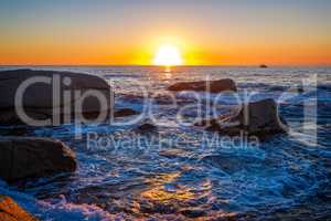 Beautiful sunrise in a bay with rocks in Costa Brava, Spain