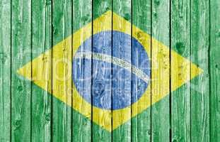 National flag of Brazil on old white wood background