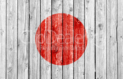 National flag of Japan on old wood background