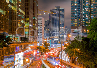 Night Street of Hong Kong with Skyscrapers and Traffic