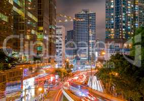 Night Street of Hong Kong with Skyscrapers and Traffic