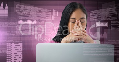 Businesswoman working on laptop with screen text interface