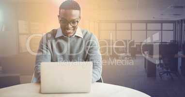 Young businessman working on laptop