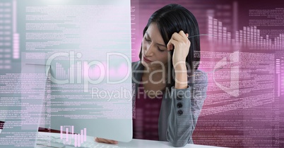 Businesswoman working on laptop with screen text interface Businesswoman working on laptop with screen text interface
