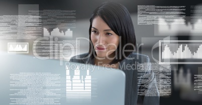 Businesswoman working on laptop with screen text interface