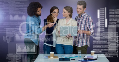 Group of people working on laptop with screen text interface