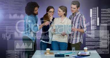 Group of people working on laptop with screen text interface