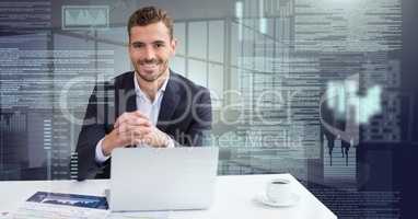 Businessman working on laptop with screen text interface