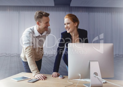 Business couple working on computer