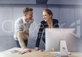 Business couple working on computer