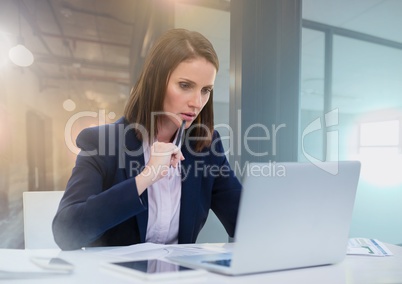 Businesswoman working on laptop