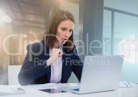 Businesswoman working on laptop