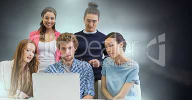Group of people working on laptop