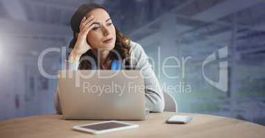 Businesswoman working on laptop