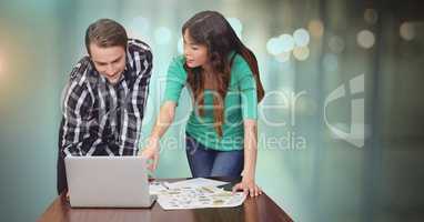 Business couple working on laptop