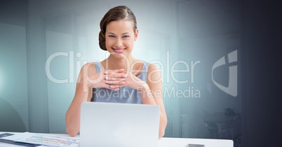 Businesswoman working on laptop