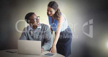 Business couple working on laptop