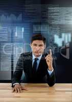 Businessman working on laptop with screen text interface