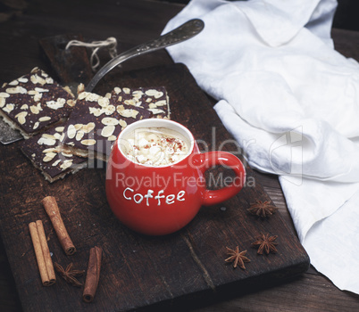 black coffee with marshmallows in a red ceramic bow