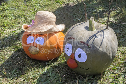 Two large pumpkins in the form of funny men.