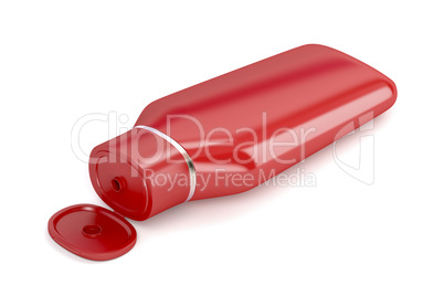 Red plastic shampoo bottle